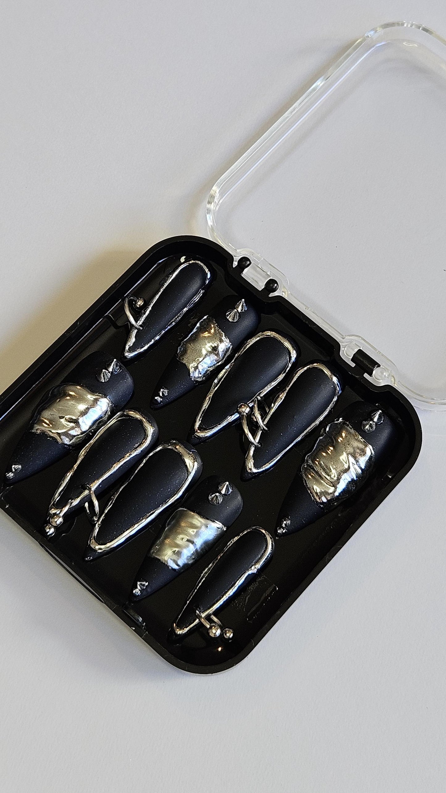 Piercings, Molten Metal, Spikes. Choose Nail Shape and Length.